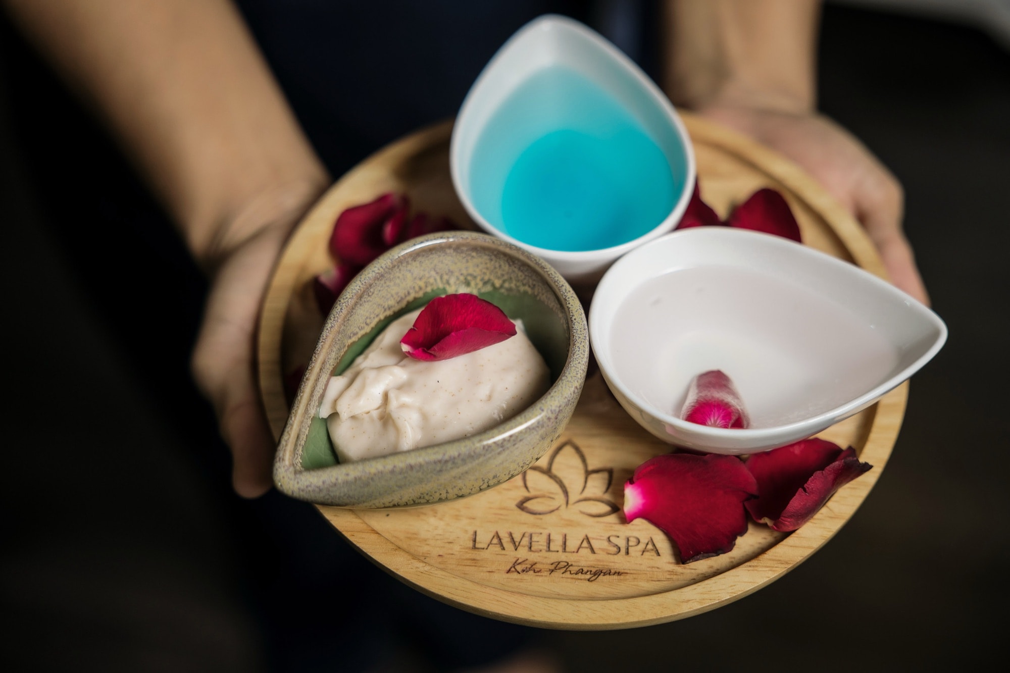 Lavella's own scrub and oils on an engraved wooden tray